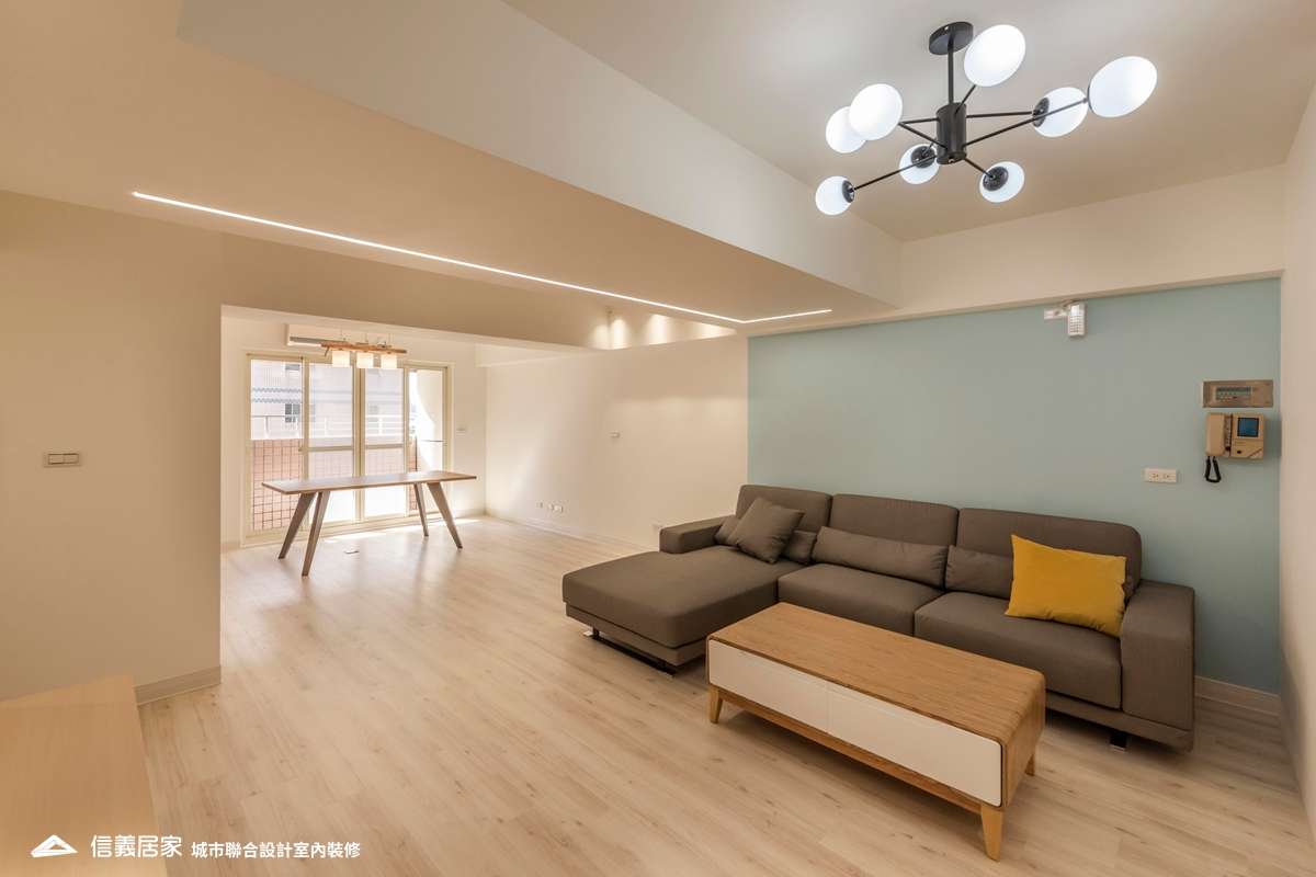 米色客廳室內裝潢設計，包括茶几、L型沙發裝潢圖片