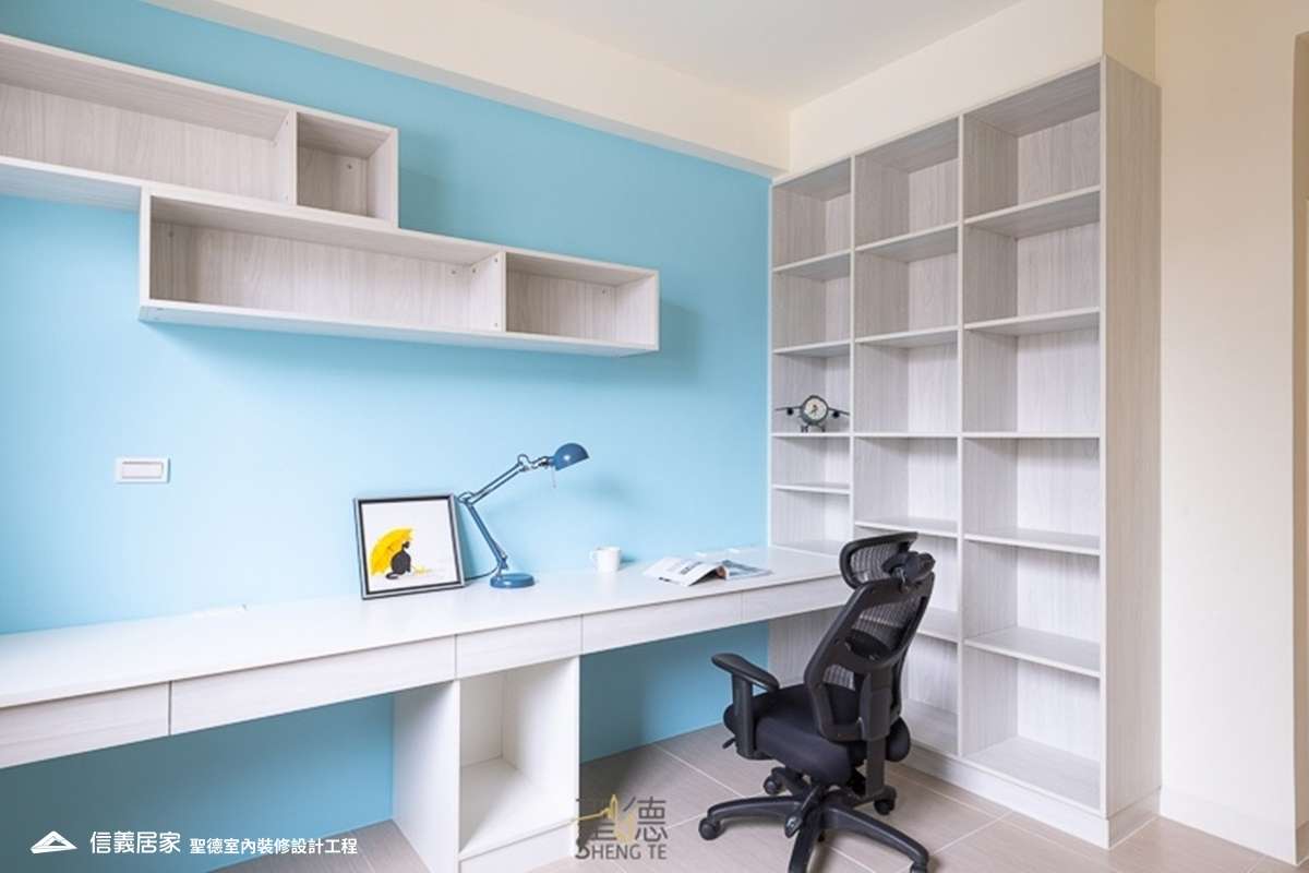 藍色書房室內裝潢設計，包括收納櫃、椅子、書桌、書櫃、置物櫃裝潢圖片