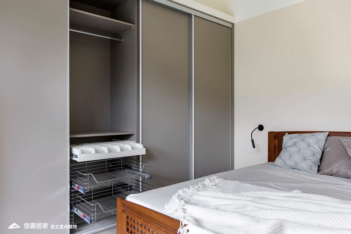 灰色臥室室內裝潢設計，包括床、置物櫃裝潢圖片